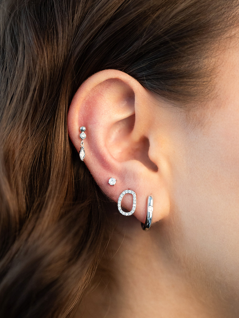 Menorca M piercing