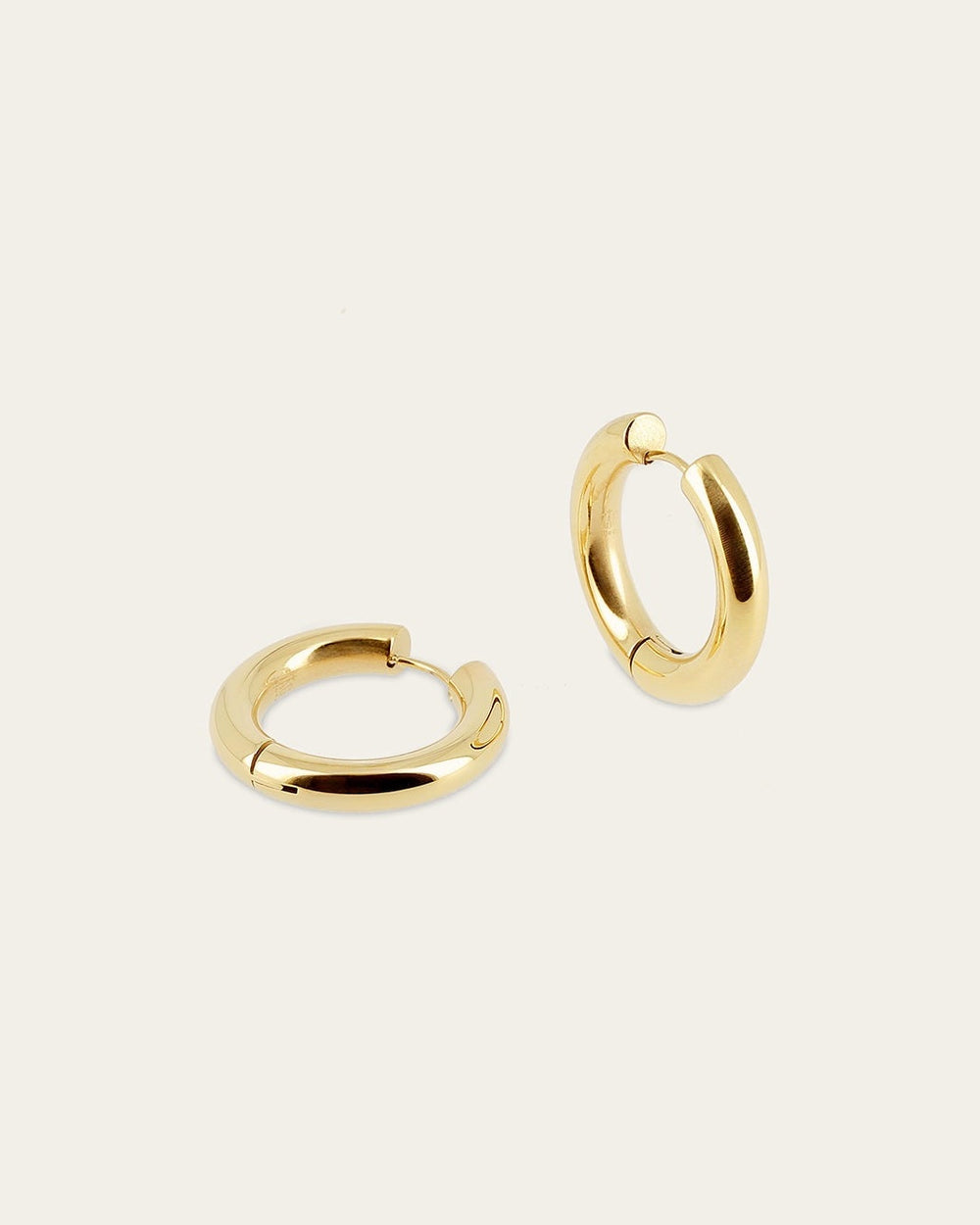 Boucles d'oreilles Nine (Acier doré)